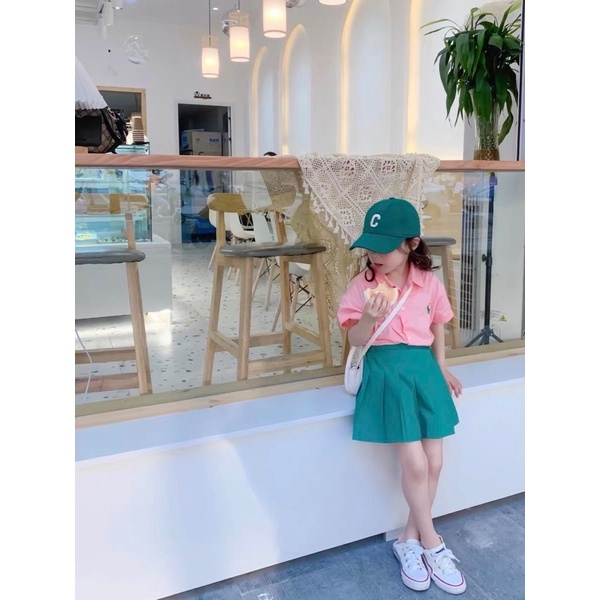Set áo polo hồng cv xanh xếp ly bé gái