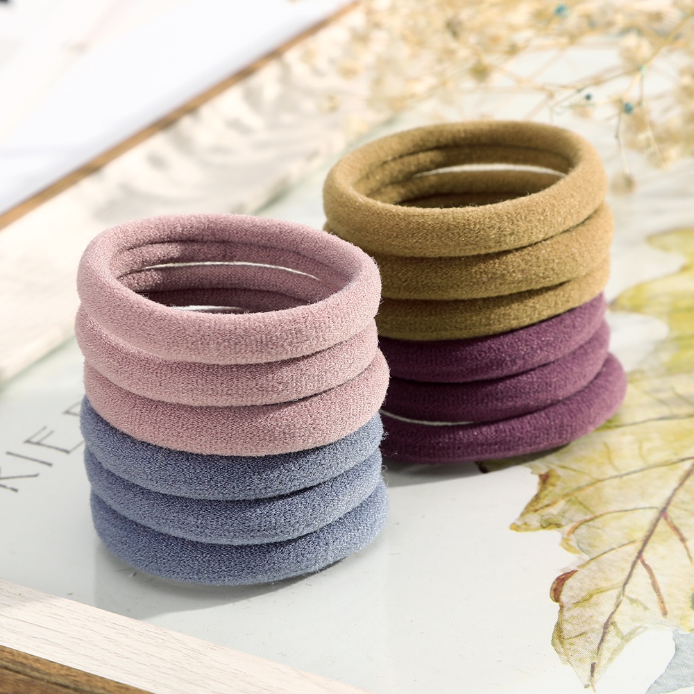 Set 50 dây buộc tóc Haimeikang không viền vải thun co giãn mạnh nhiều màu sắc trơn thời trang cho nữ