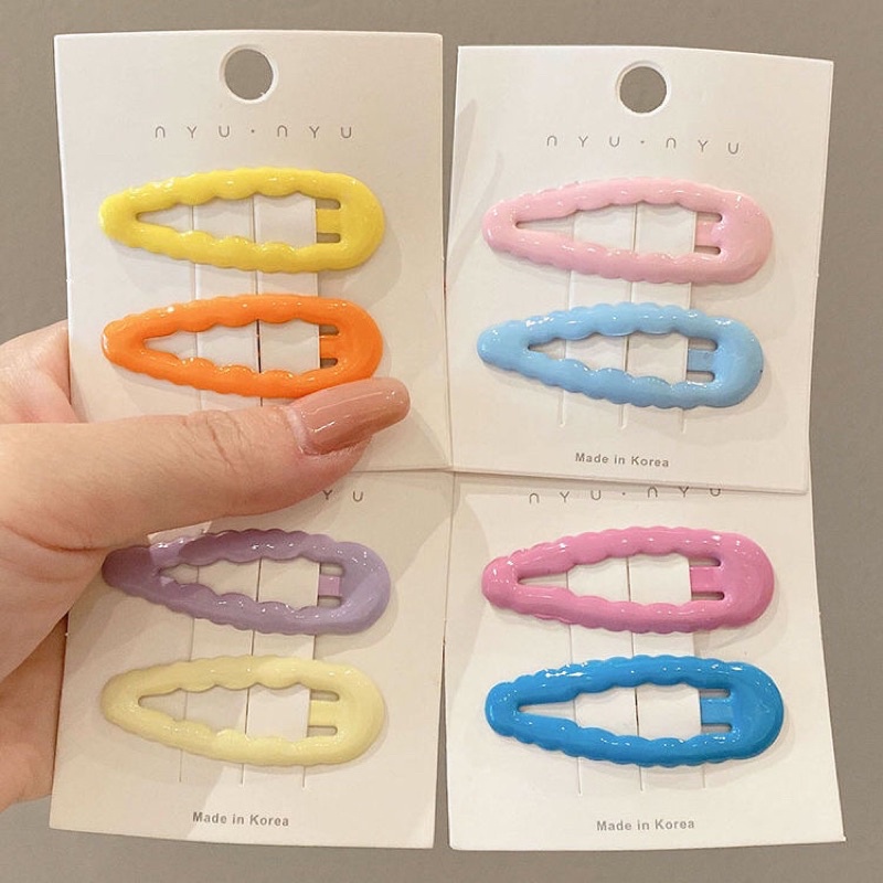 Cặp tóc viền lượn sóng màu sắc