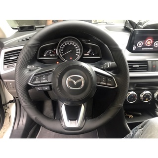 Bọc vô lăng da mazda loại khâu