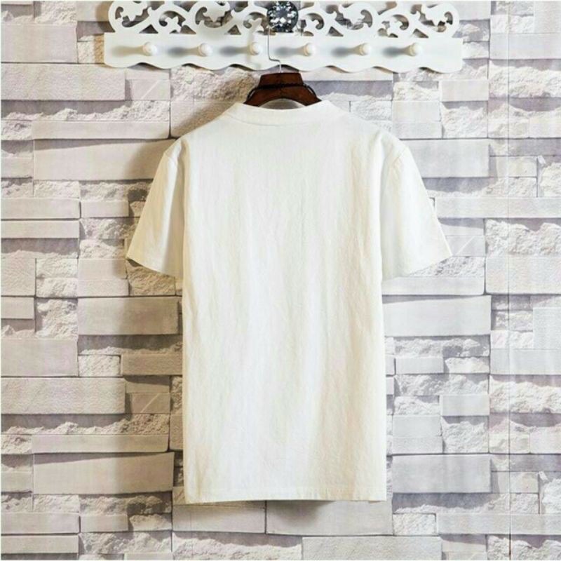 Áo chất liệu đũi cổ V mềm mát cho nam