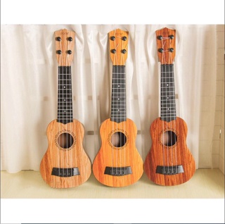 Đồ chơi đàn guitar mini vân gỗ cho trẻ tập chơi đàn