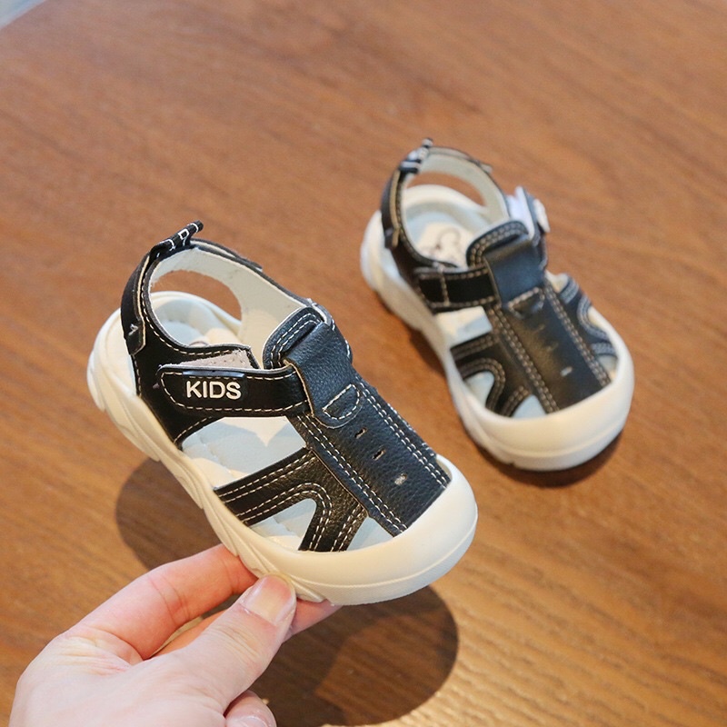 Sandal trẻ em tập đi mũi rọ KIDS dáng quai hậu chống vấp bảo vệ bàn chân bé mã SDE2