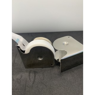 Dụng cụ cắt keo nối mi, chứa được 2 cuộn băng keo.