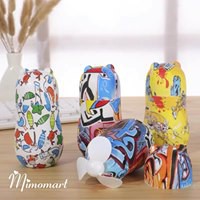 Quạt mini cầm tay kết hợp đèn vẽ hình grafic minh họa cute