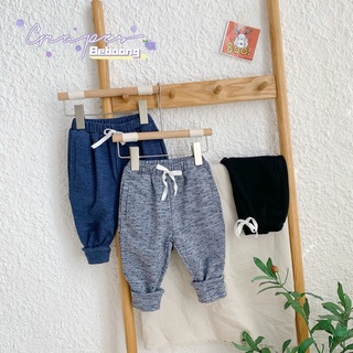 Quần Jogger da cá bé trai