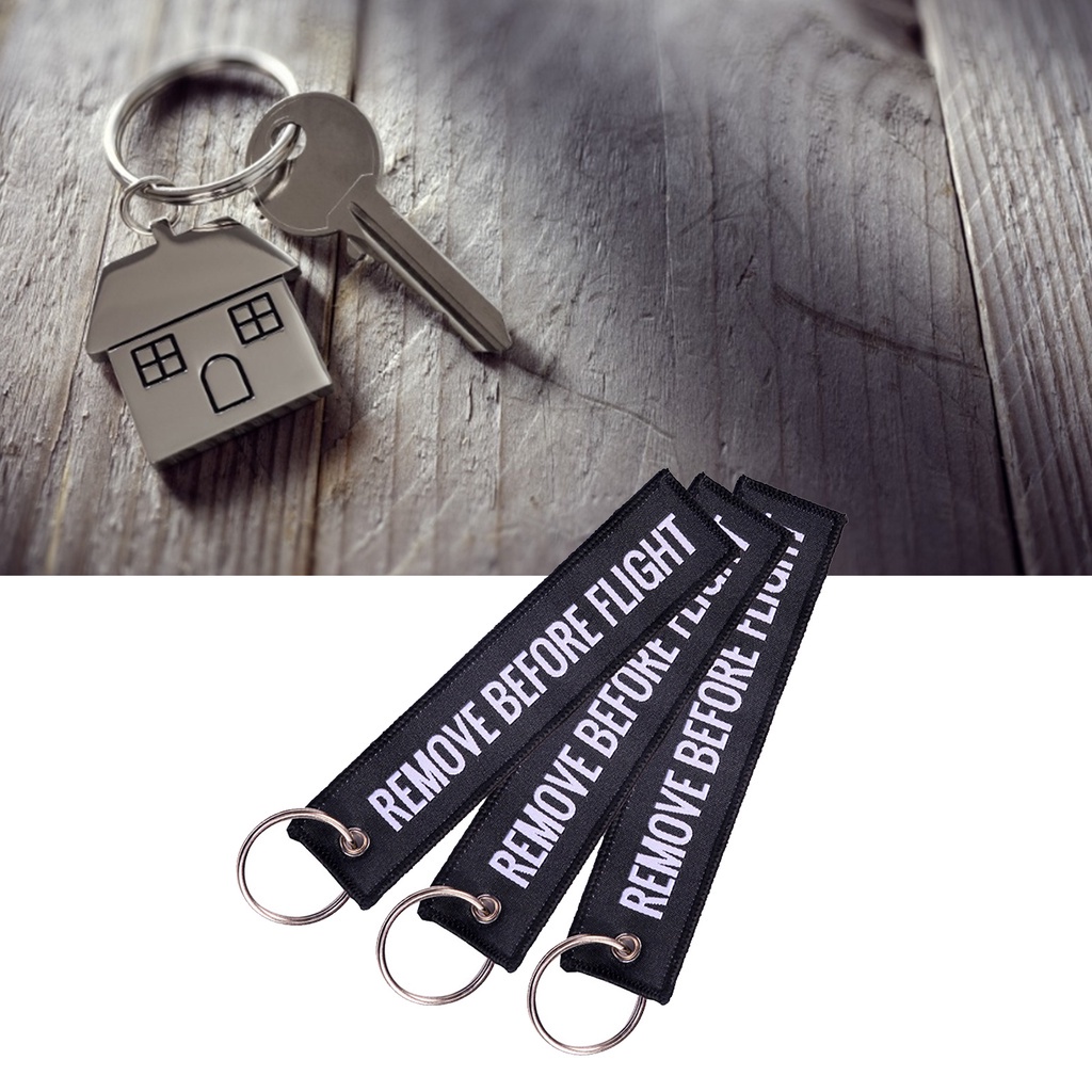 Móc khóa họa tiết chữ Remove Before Flight thời trang