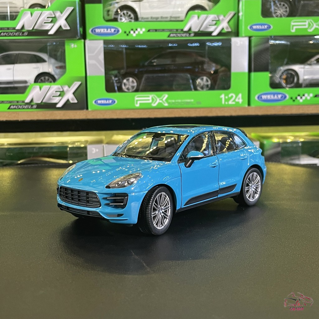 Mô hình xe ô tô Porsche Macan Turbo Hãng Welly FX tỉ lệ 1:24 màu xanh