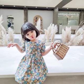 Váy hoa xanh vàng cúc lưng cho bé gái
