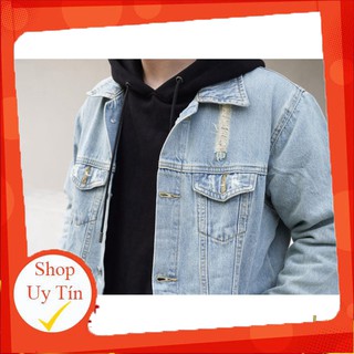 Distressed denim jacket