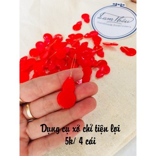 Dụng cụ xỏ chỉ