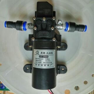 bơm mini (chưa có nguồn) để chế máy phun sương (có sẵn 2 tai nối ống phun sương) hoặc tăng áp máy gặt rửa xe tướicây