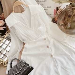 Đầm trắng phối voan tơ cổ đắp đính nút