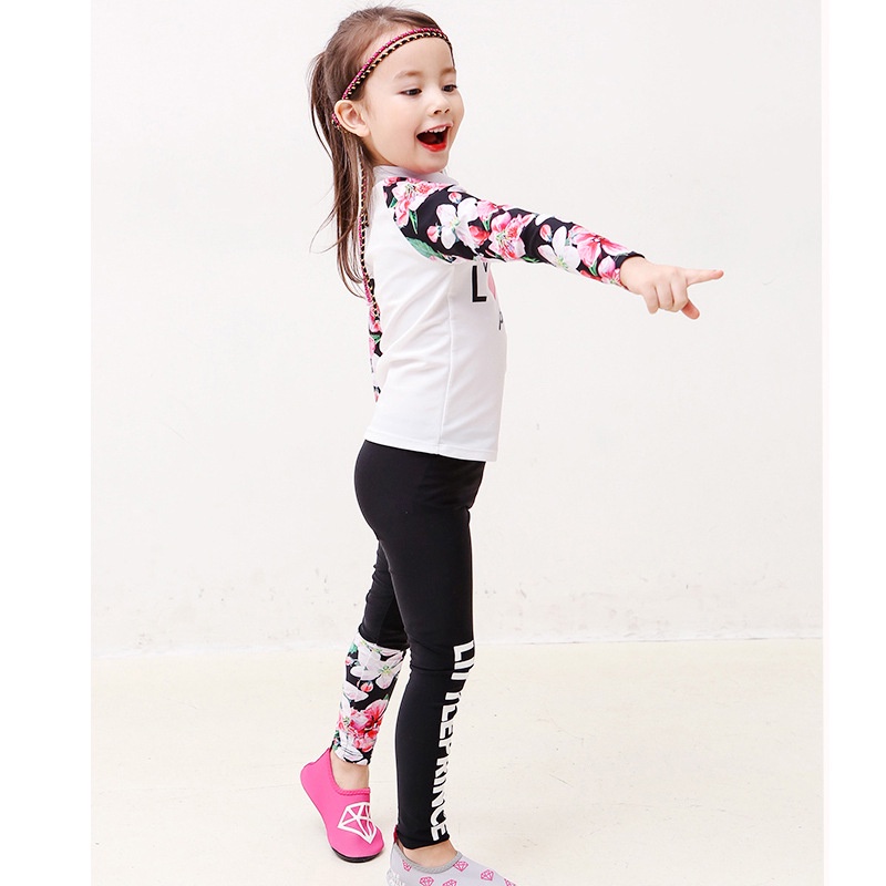 Bộ đồ bơi hai mảnh tay dài in họa tiết hoa dành cho người lớn trẻ em