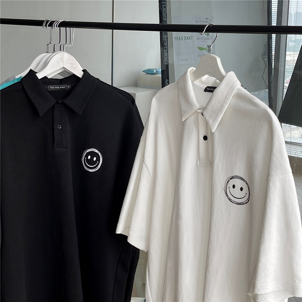 Áo thun polo ngắn tay dáng rộng in hình mặt cười phong cách Hàn Quốc cho nam và nữ