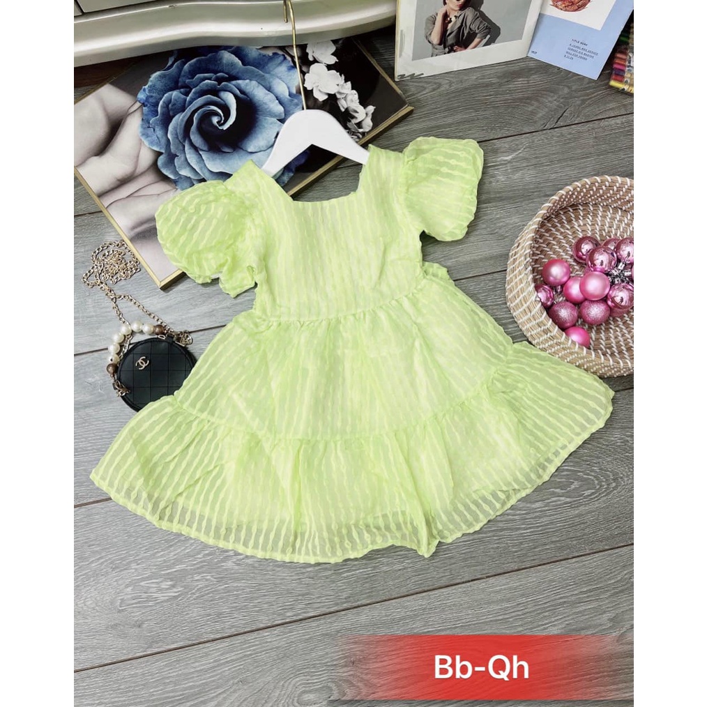 Đầm tay bồng màu xanh cốm nơ sau lưng cho bé gái