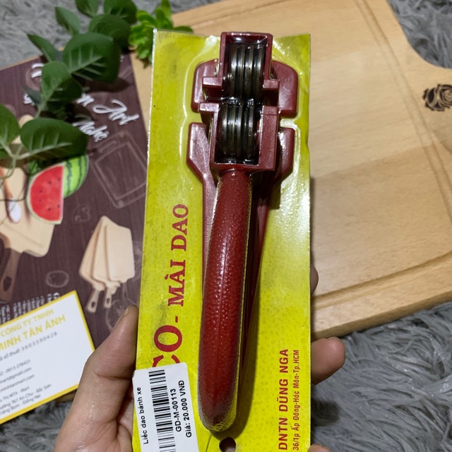 Dụng cụ mài/liếc dao bánh xe .