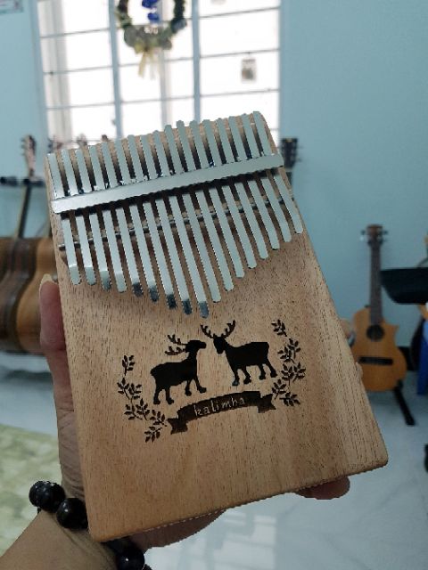 Đàn Kalimba BMS gỗ mahogany 17 phím kèm túi đựng + búa chỉnh âm + dán nốt + hướng dẫn (hình nai)