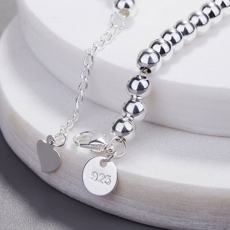 Vòng tay chuỗi hạt may mắn màu bạc