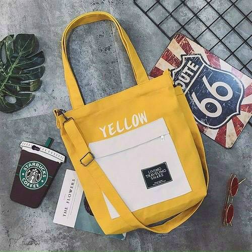 Túi đeo vai vải canvas màu vàng, có thể mix với nhiều kiểu trang phục khác nhau, túi phù hợp đi chơi hay đi dạo phố
