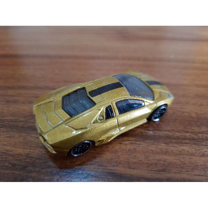 xe Hotwheels Lamborghini Reventon vàng sọc đen,  xe đẹp như hình