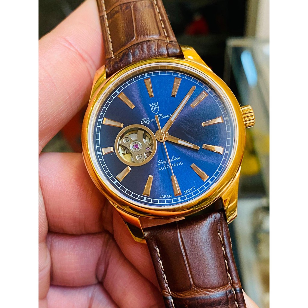 Đồng hồ nam Olym Pianus OP9927-71AMK-GL-X - Mặt xanh dương viền vàng dây nâu