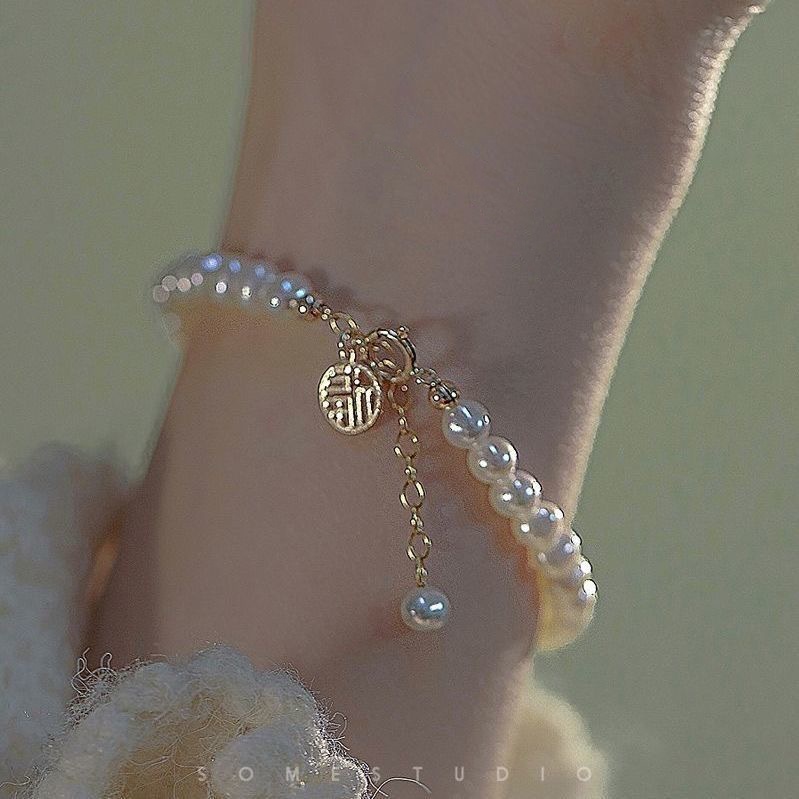 Vòng Tay Chuỗi Hạt Ngọc Bích Nhân Tạo Hình Thỏ Thời Trang Cho Nữ