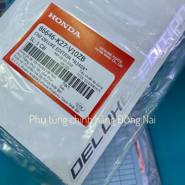 TEM CHỮ “DELUXE EDITION” MÀU INOX NỀN TRẮNG/ĐEN ZIN CHÍNH HÃNG HONDA