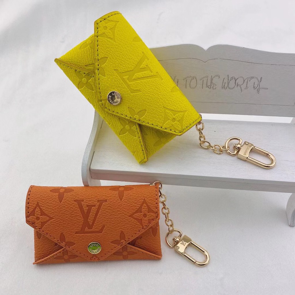 Stock brand Lou V embossed lychee grain leather non-slip soft bag colorful envelope shape flip cover card holder for men and women. Credit card holder. Card holder. Business card holder. Coin purse.