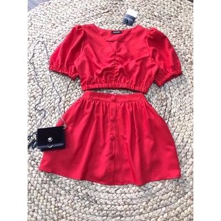 Quần váy bọc nút + áo crop bo chun