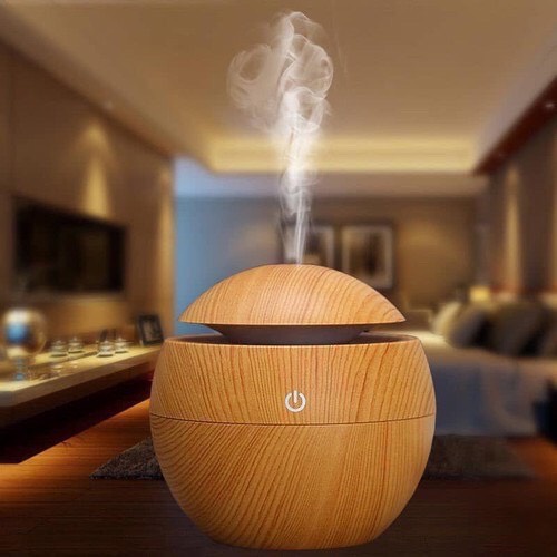 Máy xông tinh dầu.Máy phun sương tạo độ ẩm Vân Gỗ Aroma tròn nhỏ gọn