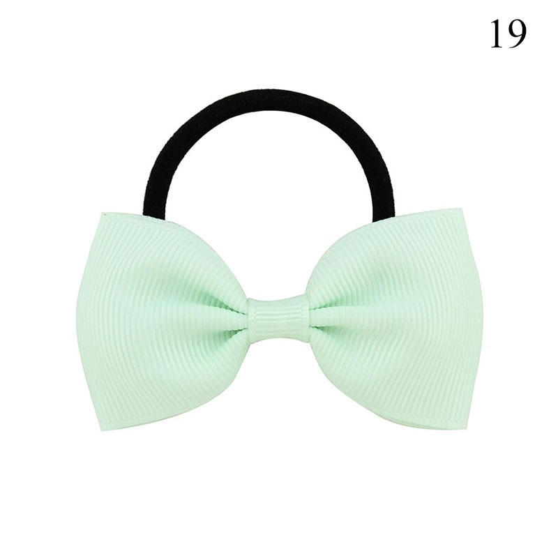 Dây thun buộc tóc phối nơ bướm bằng vải màu trơn dành cho bé gái