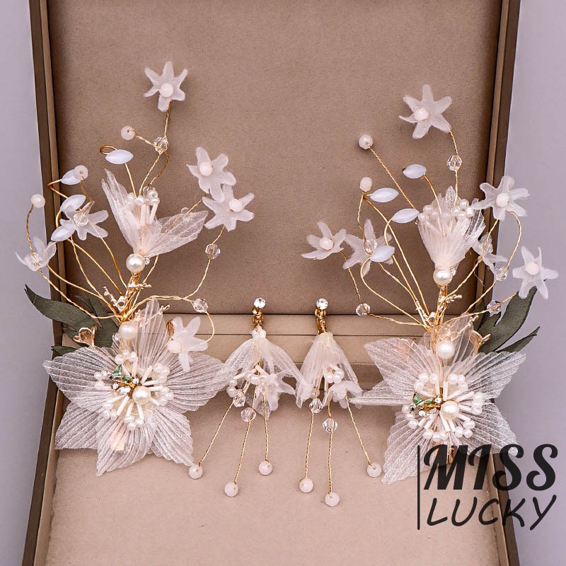 Khuyên tai và kẹp tóc cô dâu thời trang thanh tú