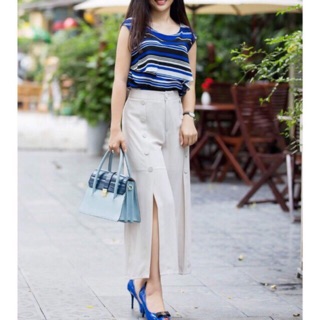 Quần nữ ống rộng xẻ tà phối nút
