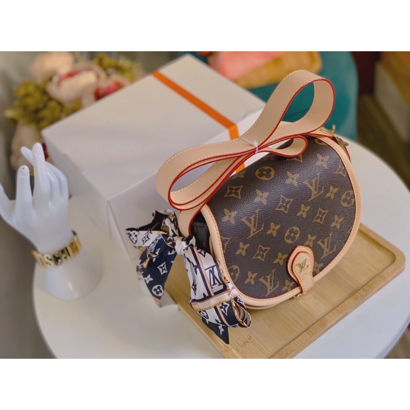 Túi lv tambourine cannas