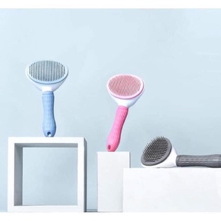 lược chải lông có nút bấm