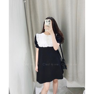 Váy đen cổ bèo trắng cúc đá