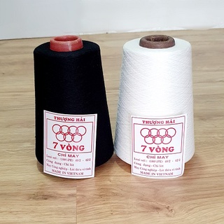 Cuộn chỉ may công nghiệp sợi 40/2 thông dụng loại cuộn lớn 20.000 mét tầm 410g đen/trắng