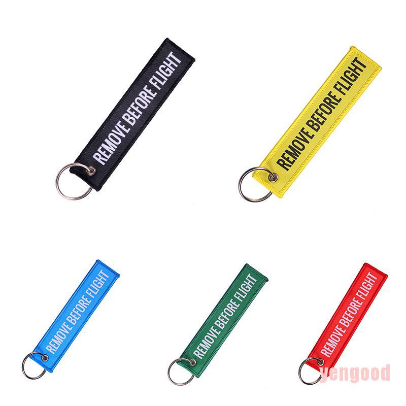 Móc khóa thêu chữ REMOVE BEFORE FLIGHT nhiều màu tùy chọn