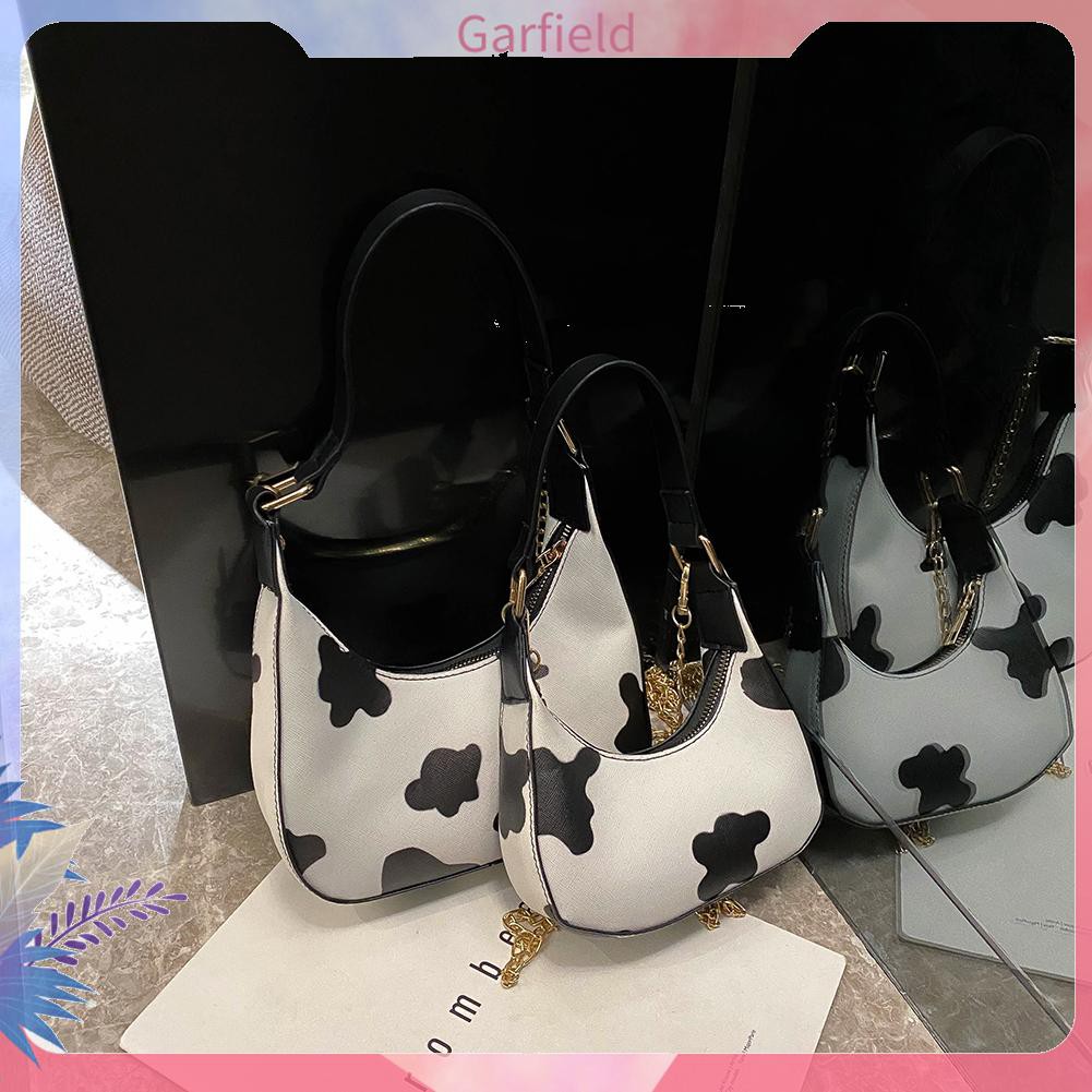 Túi xách da họa tiết da bò sữa thời trang nữ sành điệu | BigBuy360 - bigbuy360.vn