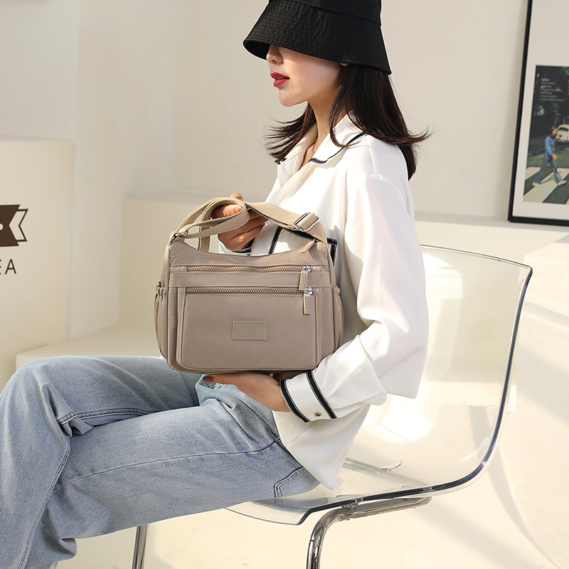 Túi Đeo Một Bên Vai Bằng Vải Nylon Cỡ Lớn Nhiều Ngăn Cách Mới Hợp Thời Trang Đơn Giản