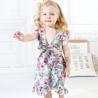 Set áo khoét lưng và chân váy đắp chéo phối bèo đáng yêu cho bé gái
