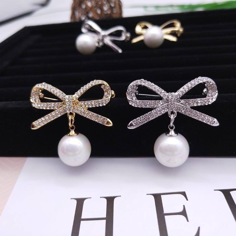 Ghim cài áo hình nơ đính ngọc trai giả