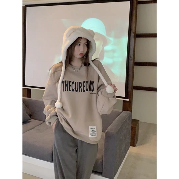 Áo sweater Thecuredwd màu be