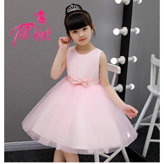 Đầm bé gái hồng xòe đính nơ