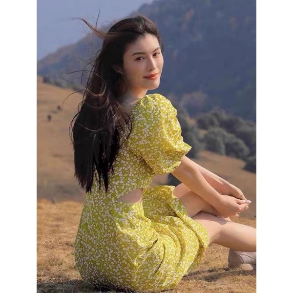 Đầm midi  hoa vàng cut out eo