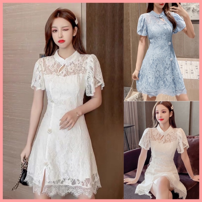 Sườn xám ren trắng cách tân vải hoa tua rua. Đầm trắng công chúa khuy hoa