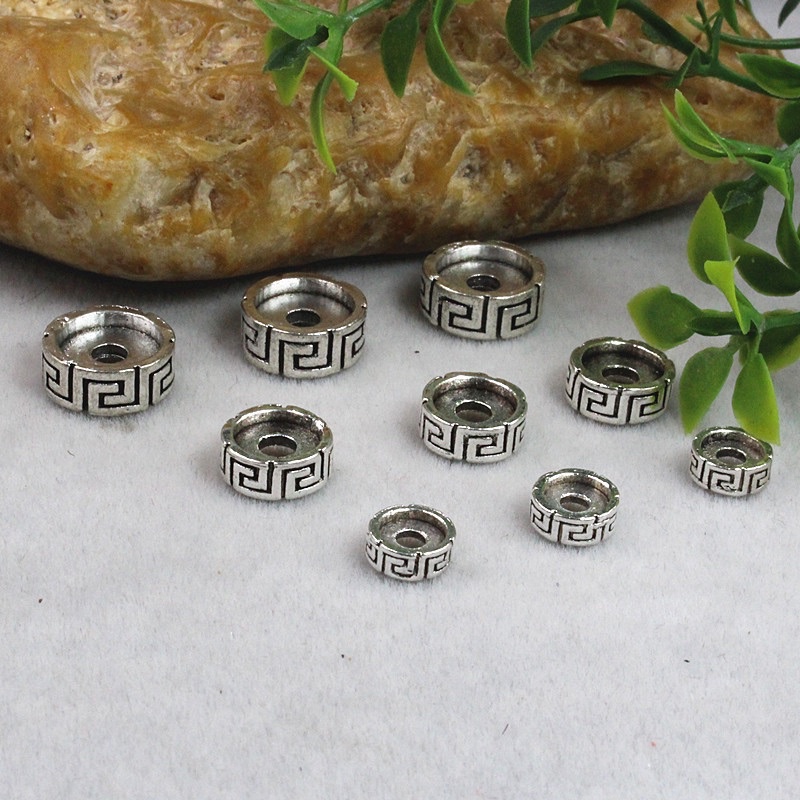 Charm chặn bạc - Hoạ tiết hoa văn