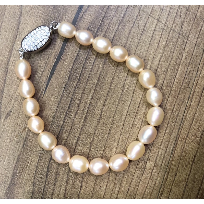 Vòng tay hạt 7-8ly khóa bạc màu hồng cam