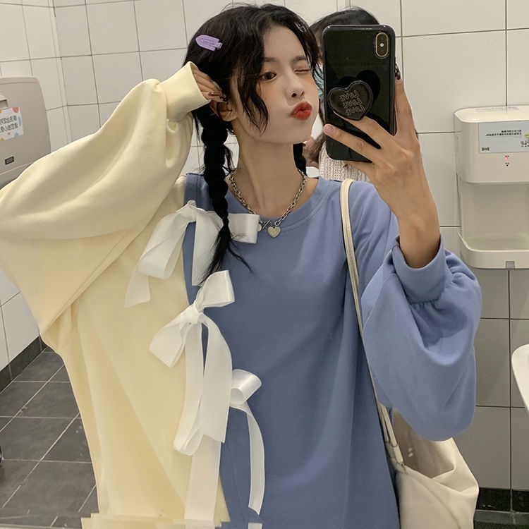 Áo sweater cổ tròn dáng rộng đính nơ màu sắc xinh xắn phong cách cá tính thời trang Hàn Quốc xuân thu cho nữ